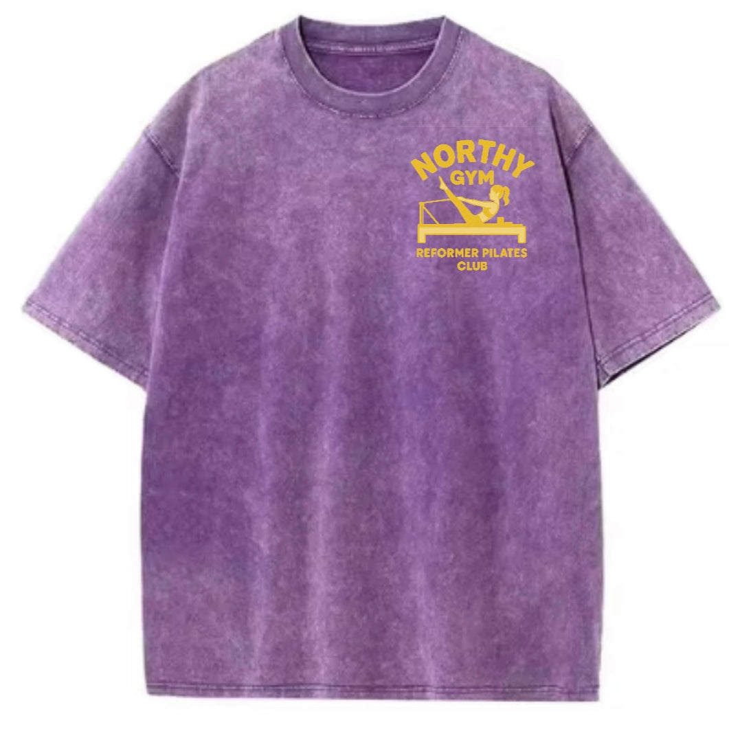 Purple t-shirt with yellow graphic and text on a white background