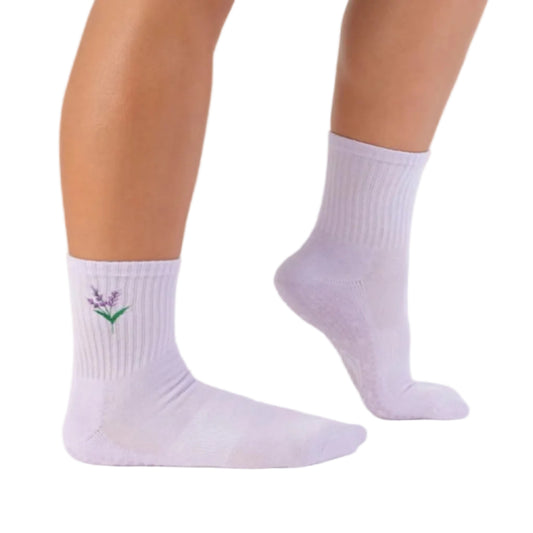 Light purple socks with a lavender flower design on a beige background