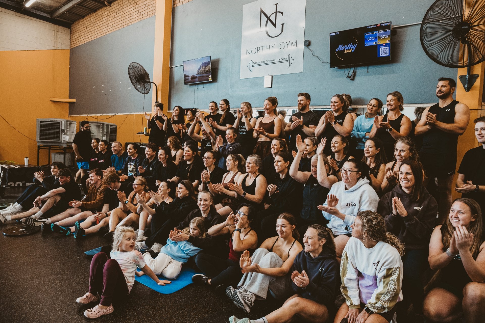 The Northy community cheering together in the gym